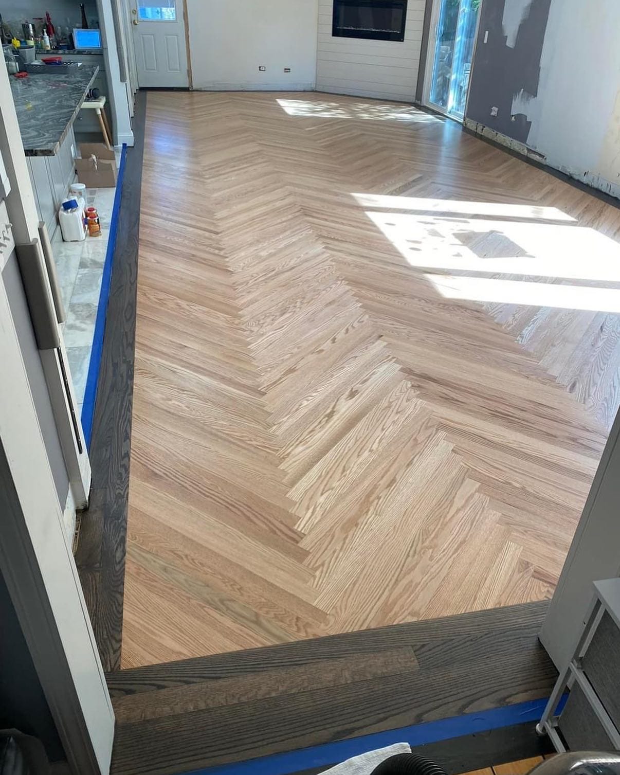 Herringbone hardwood floor by Craftsman Hardwood Floors