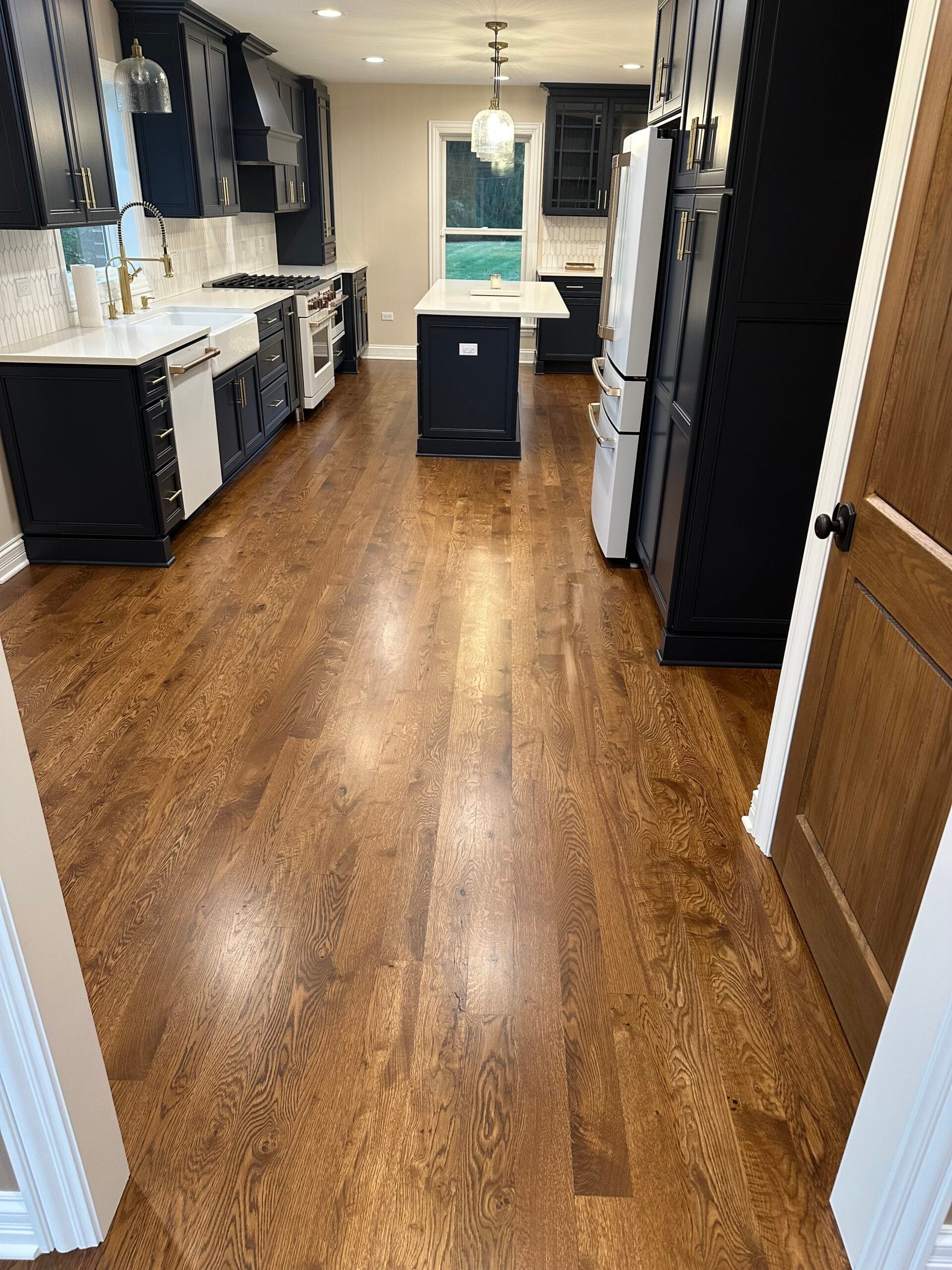 Craftsman Hardwood Floors buff and coat project