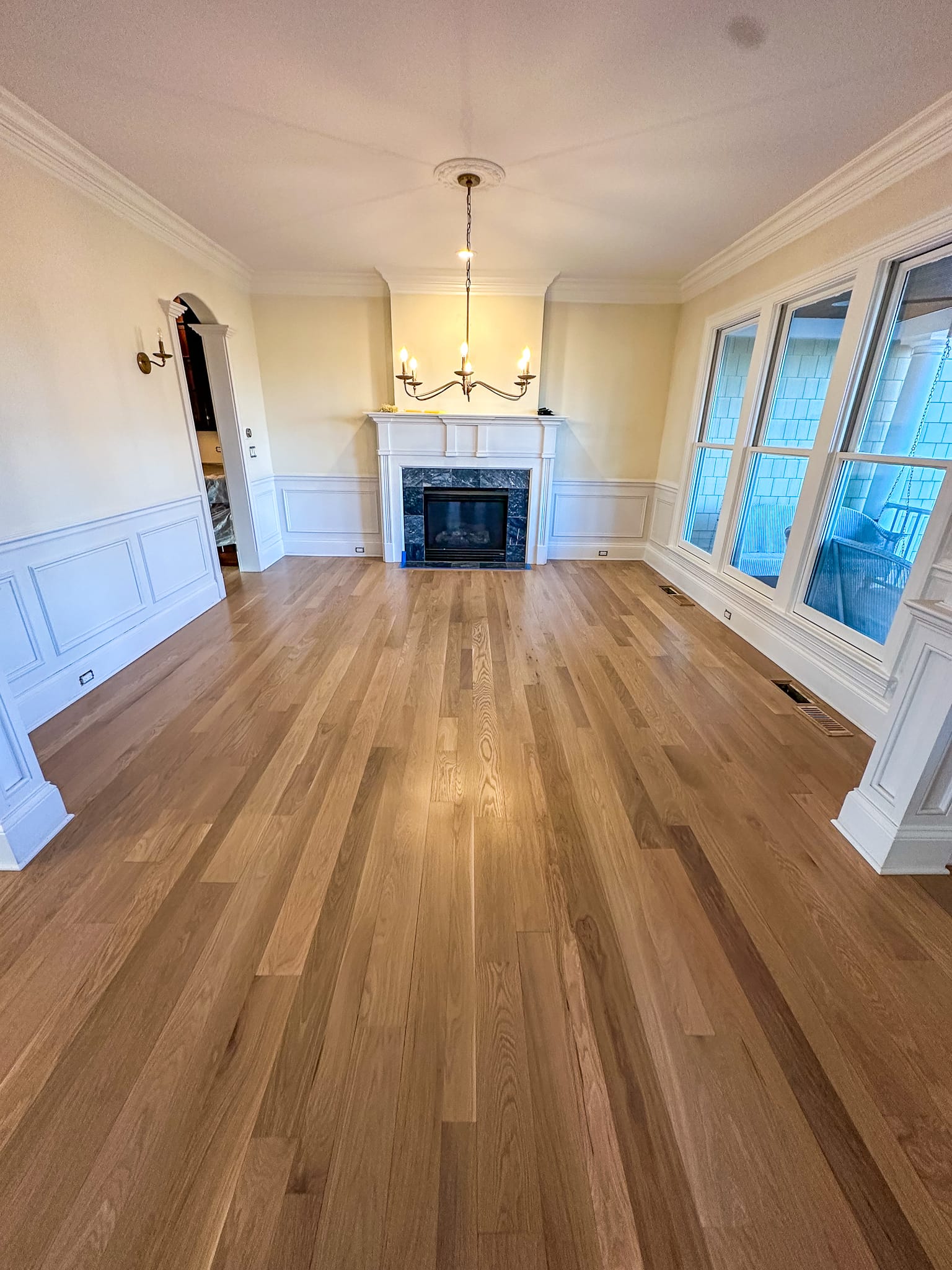 Custom hardwood flooring in a completed interior