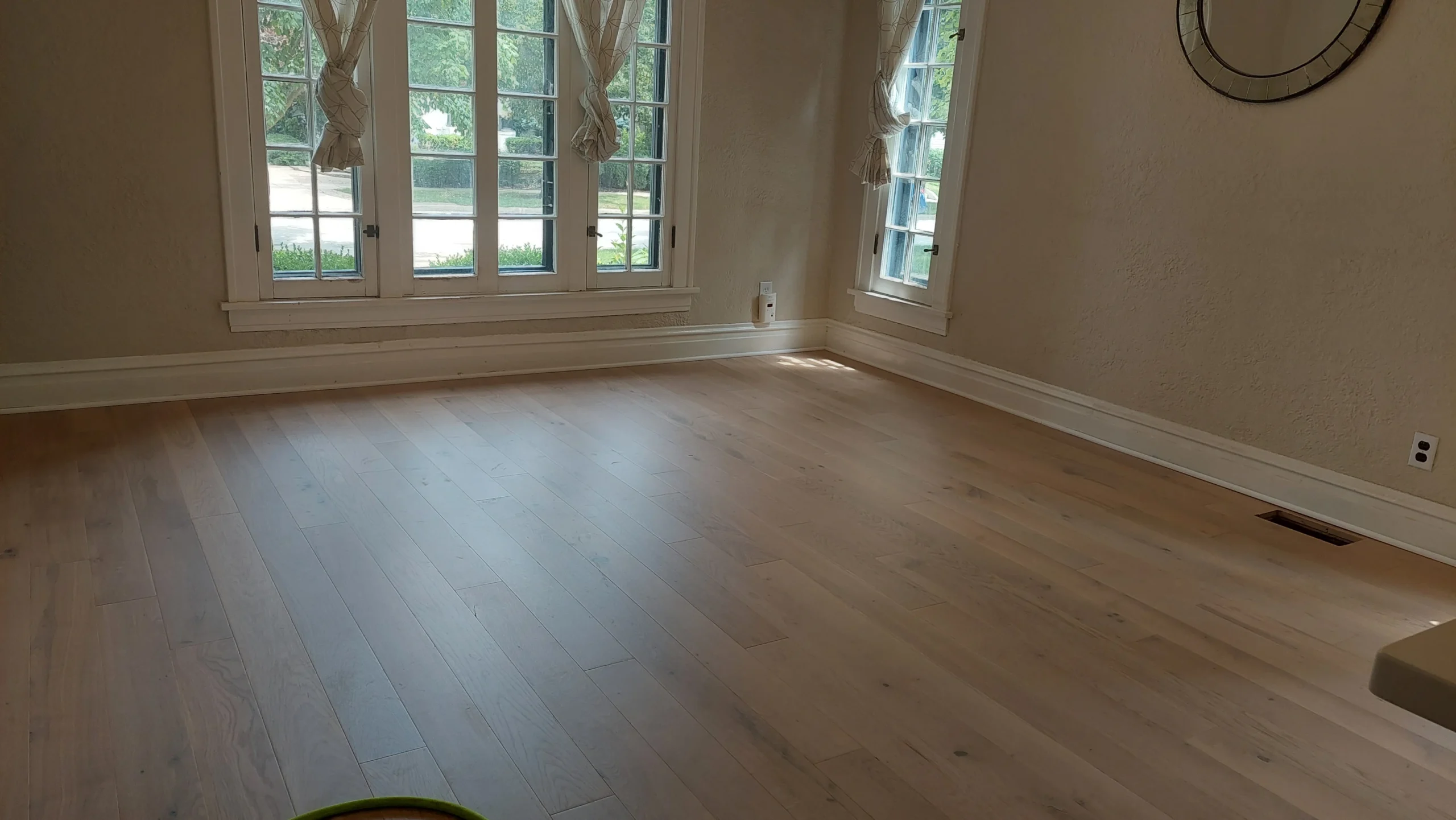 Completed hardwood floor refinishing project by Craftsman Hardwood Floors